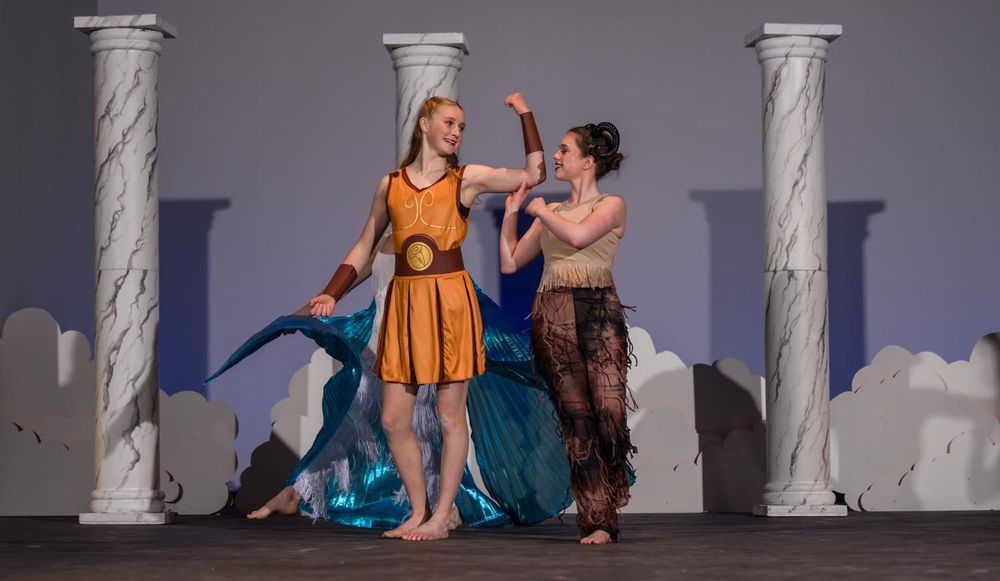 Leah Underwood performs as as Hercules, Gwen Zukerman as Phil in NPA's Hercules, 2023.