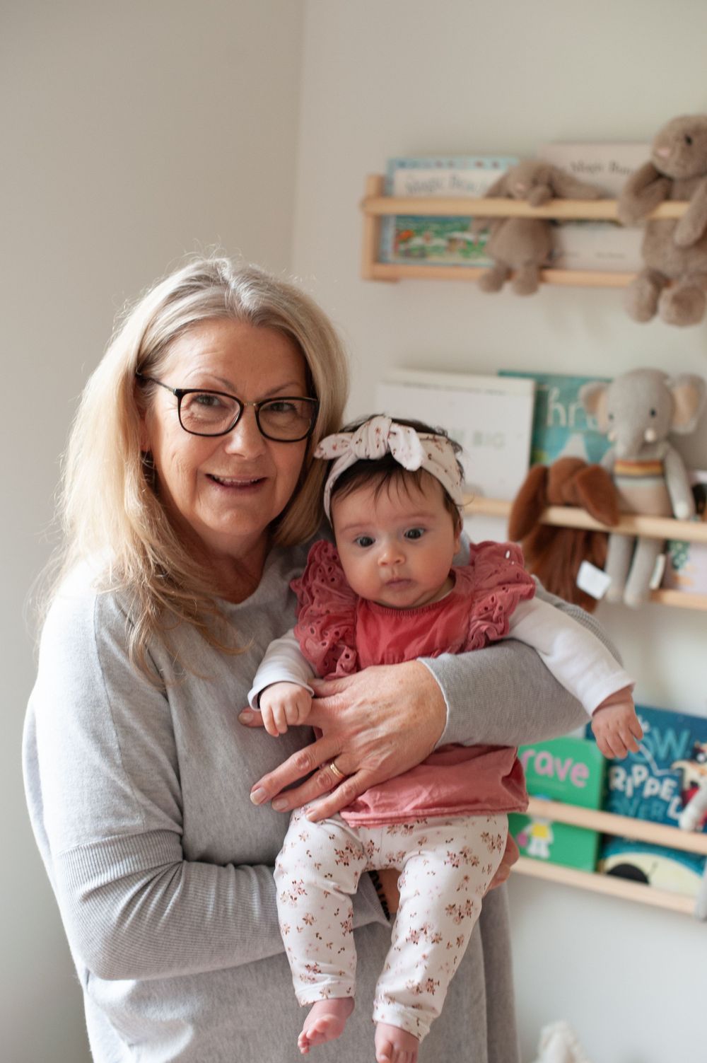 Nursery scene with stuffed animals and books on shelving in background.
Altona Family Photographer Melbourne