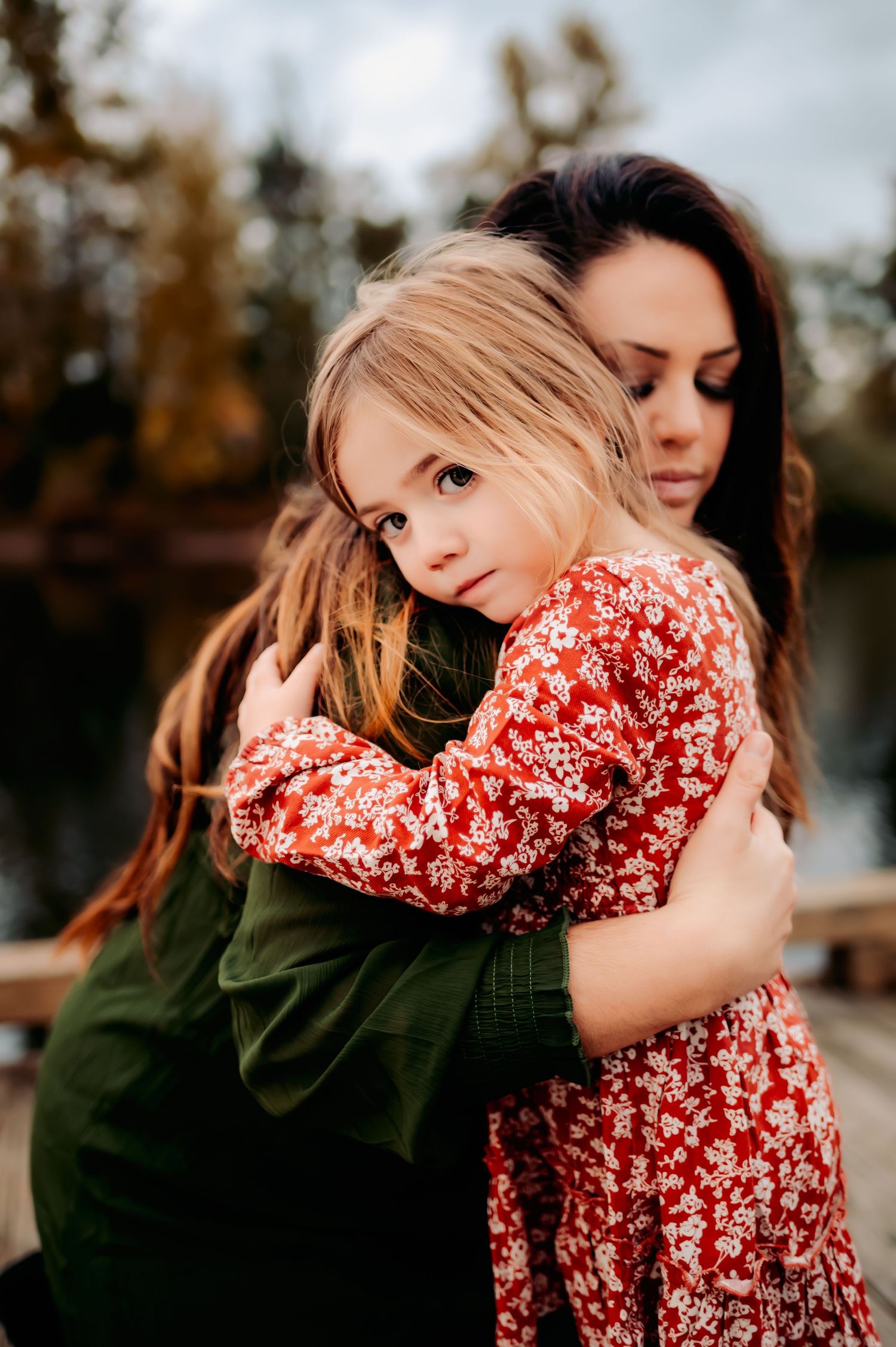 Mother comforting child.