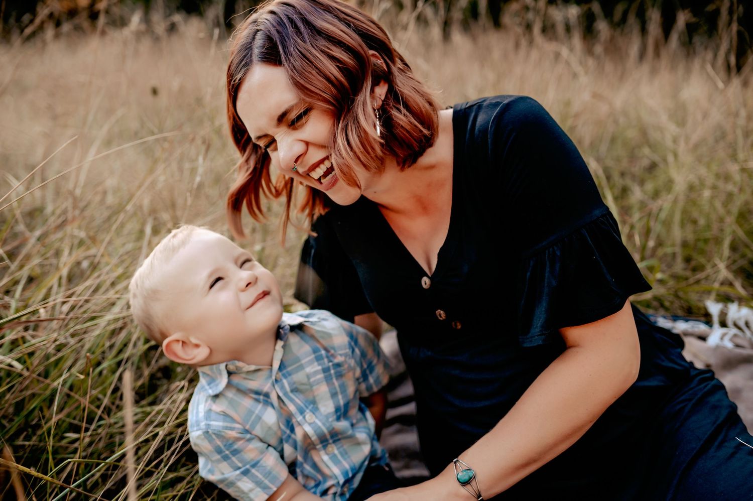 Giggling mother and child