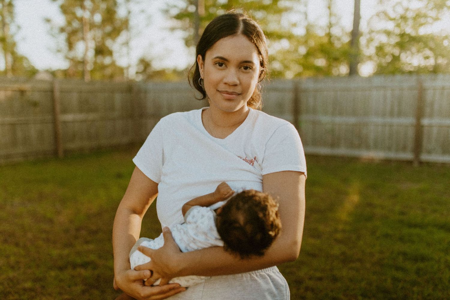 breastfeeding backyard baby photoshoot