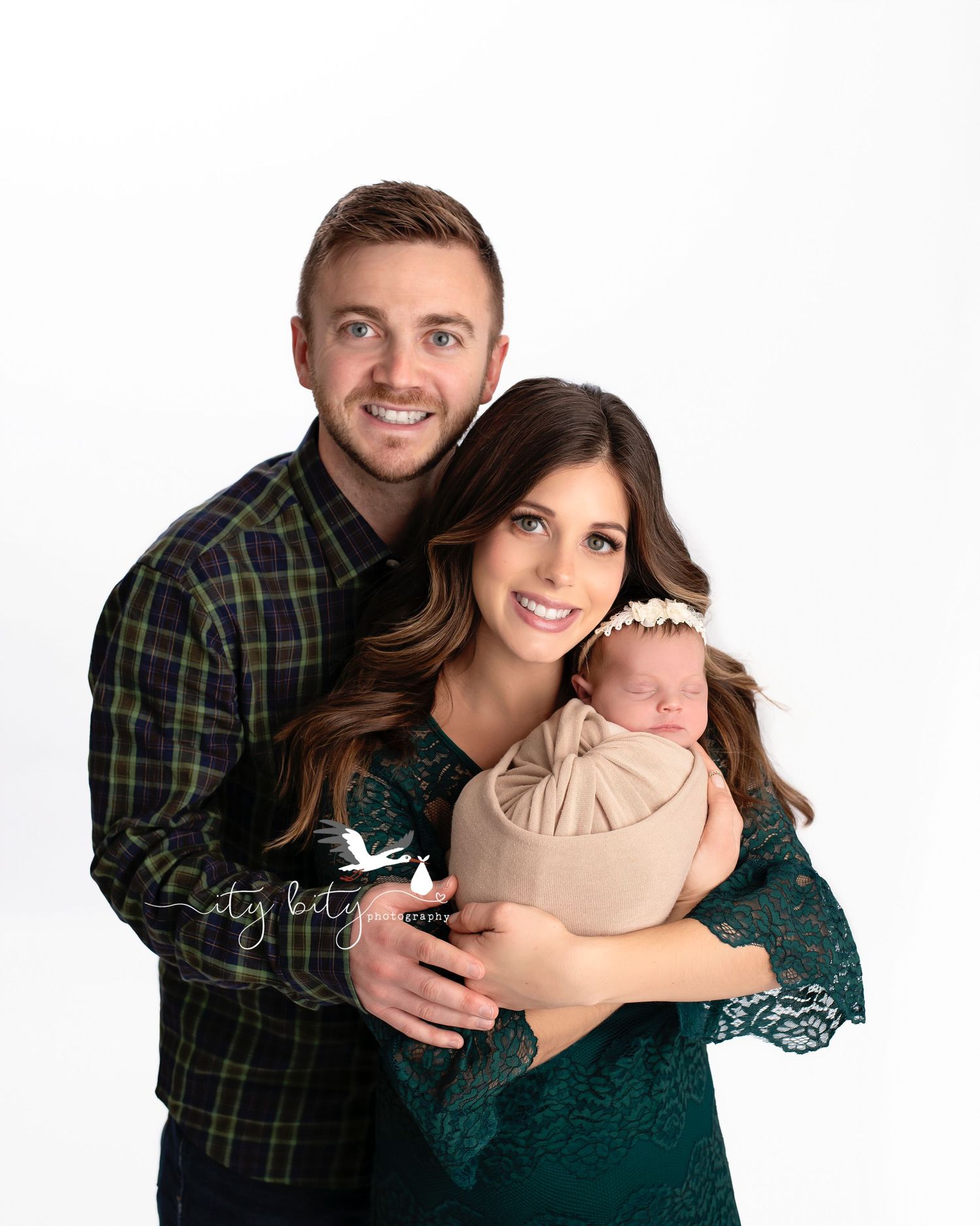 Beautiful Family Mom & Dad holding newborn baby girl Julia during Westlake Newborn Photographer Pictures