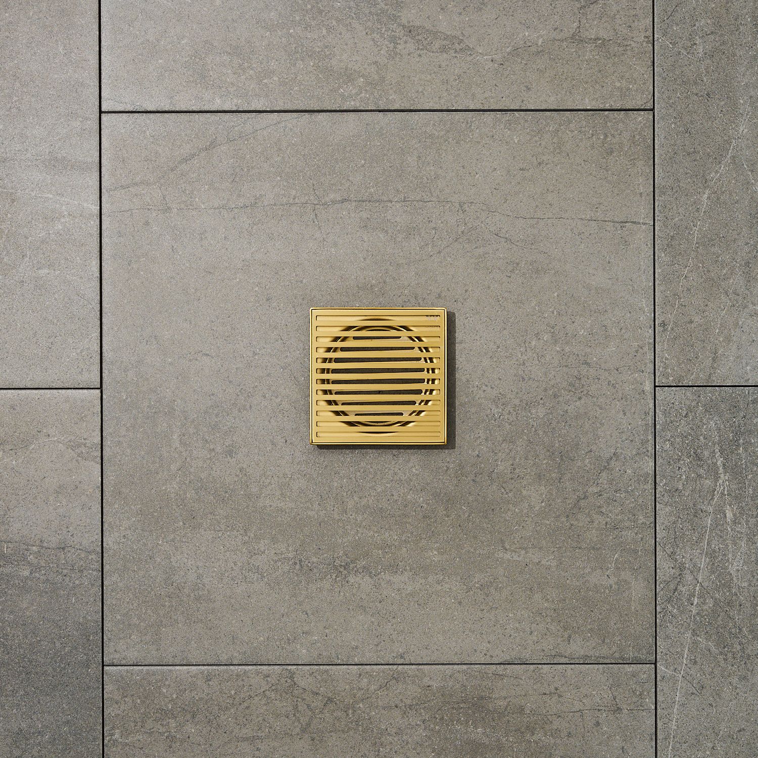 Gold square grates on grey tiles