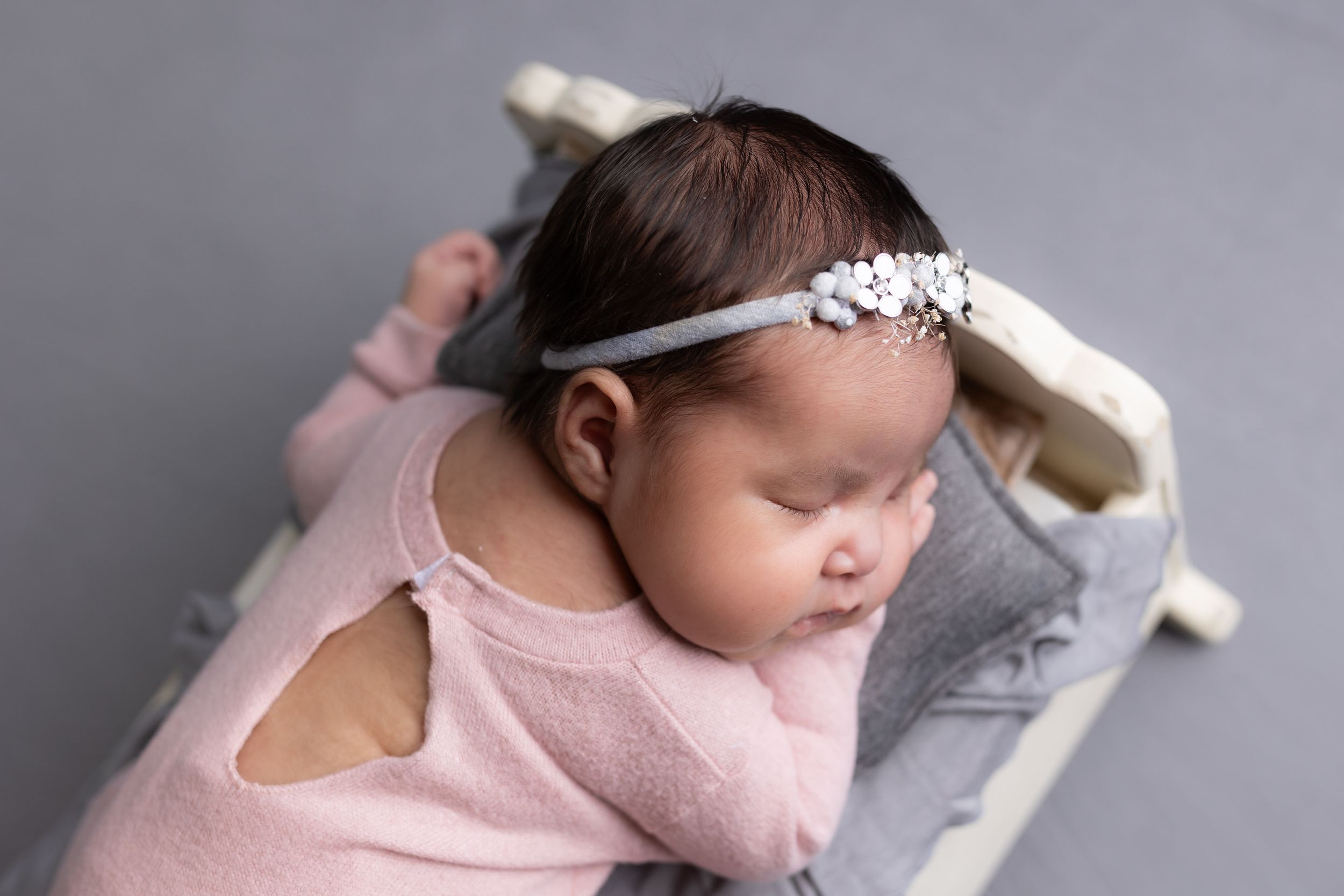 baby girl newborn prop photography by Samantha Ann Photo studio in swansboro nc near hubert, Havelock, Jacksonville, and morehead.