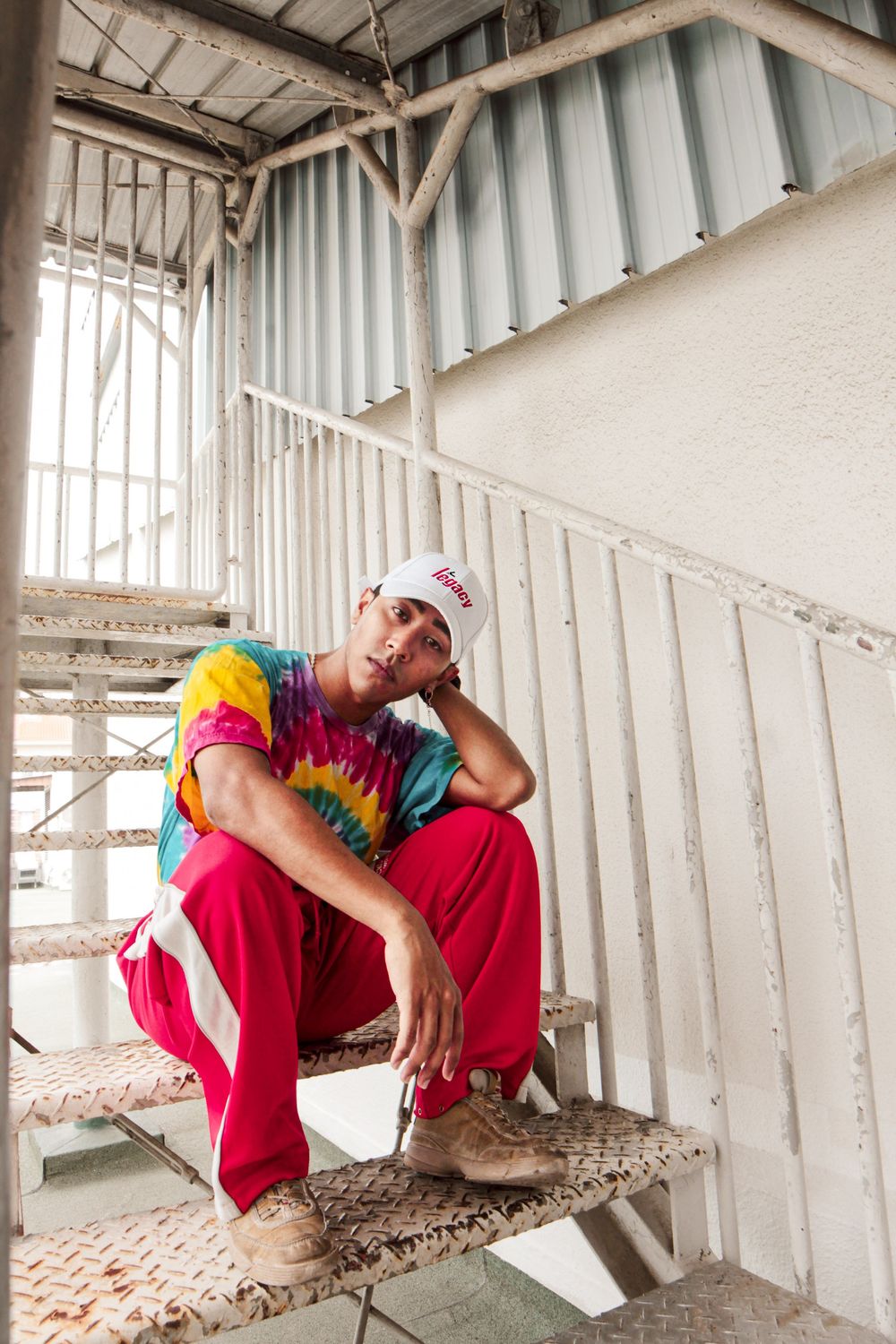 Portrait photography of a male model in a lifestyle, brand outdoor shoot in singapore