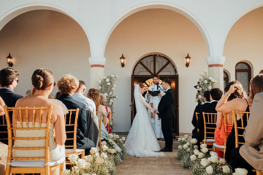 Panoramic collage of an elegant wedding ceremony with white floral arrangements and wooden chairs in a light-filled venue.