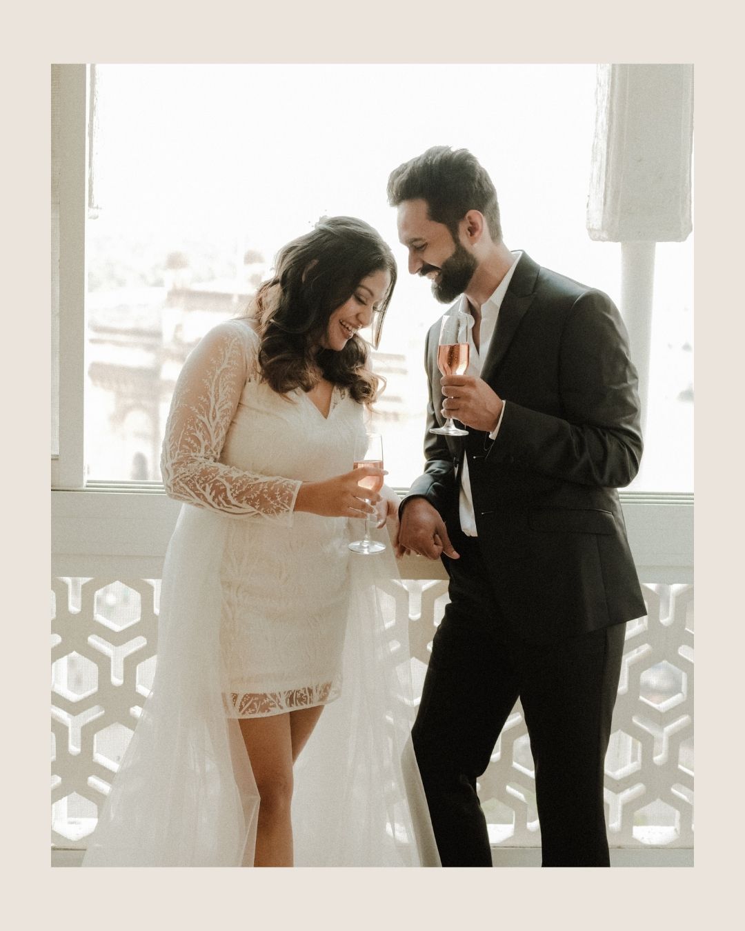 Romantic sequence showing a couple in formal wear sharing tender moments in a bright indoor setting.