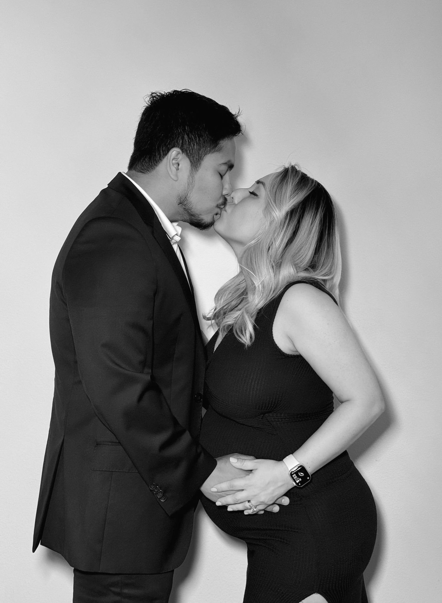 Couple shares romantic moments in monochromatic photoshoot series.