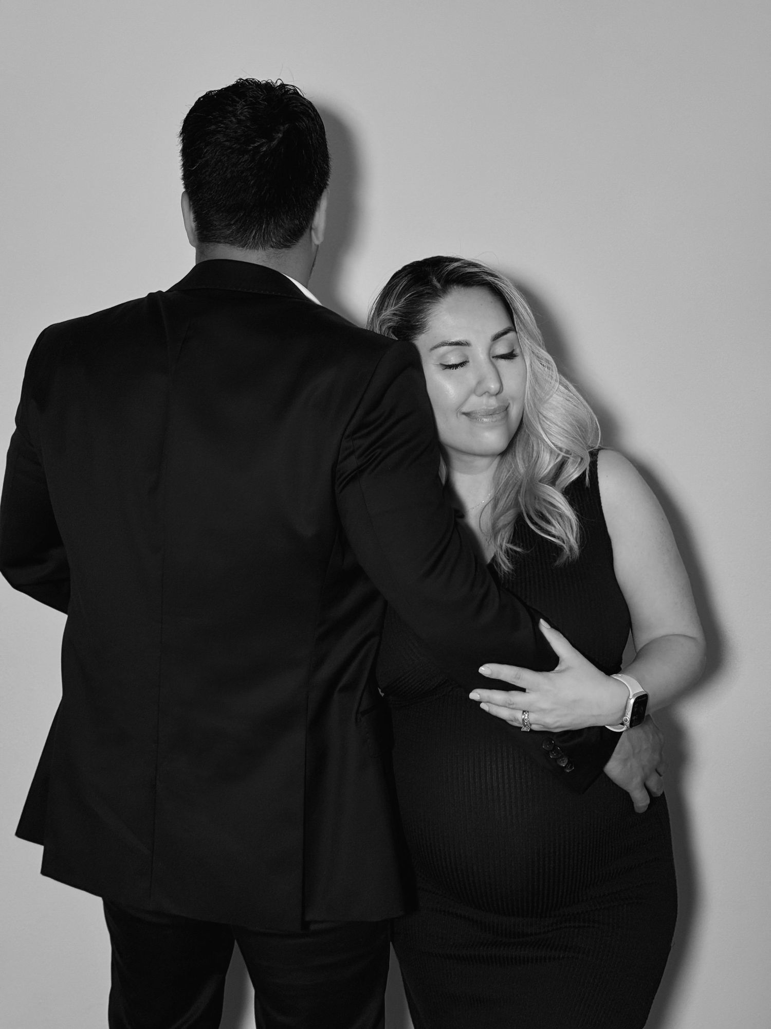 Artistic black and white portraits showing romantic connection between partners.