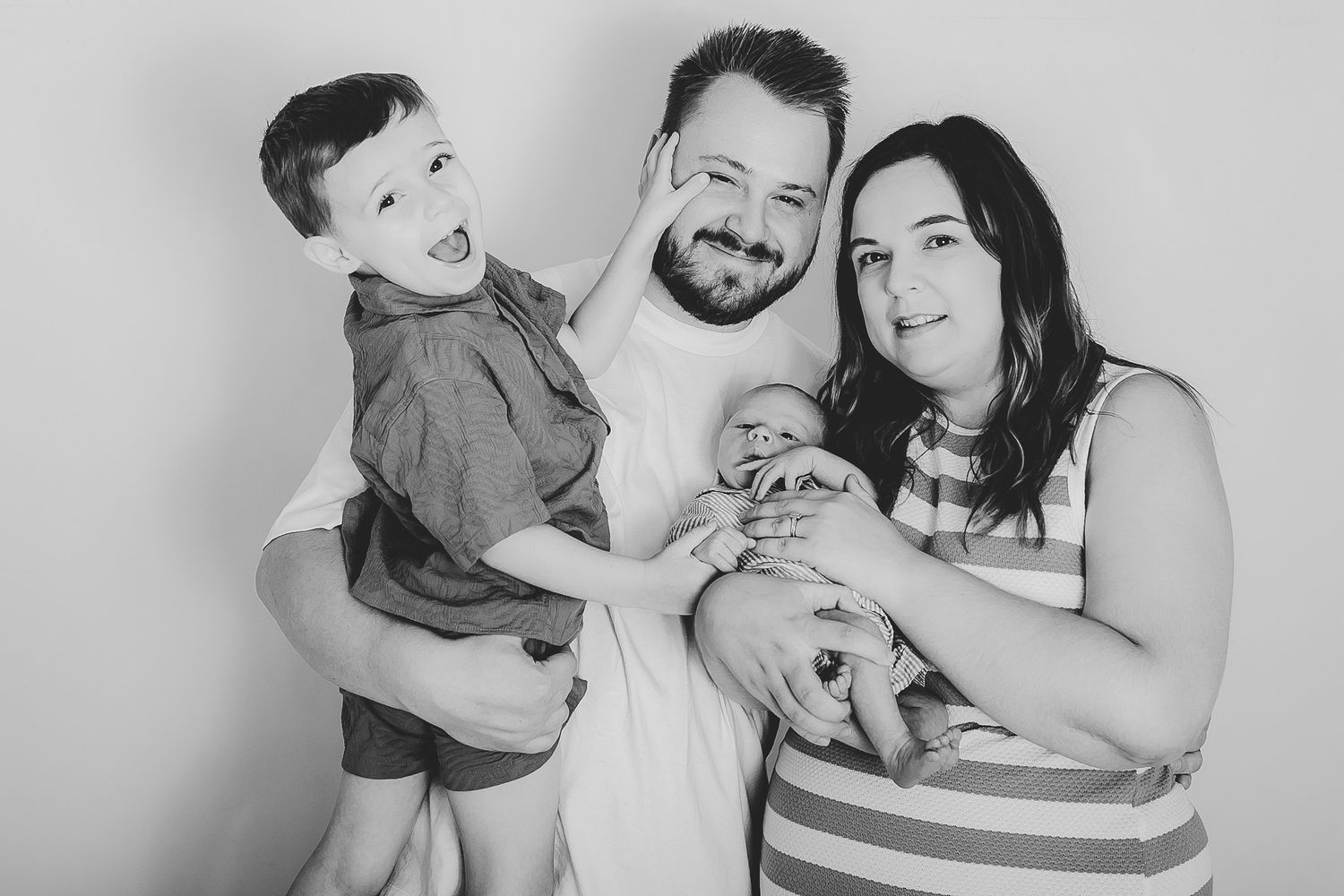 Black and white family photos showing joyful moments and laughter. Photographer. Hull. East Yorkshire. Photography
