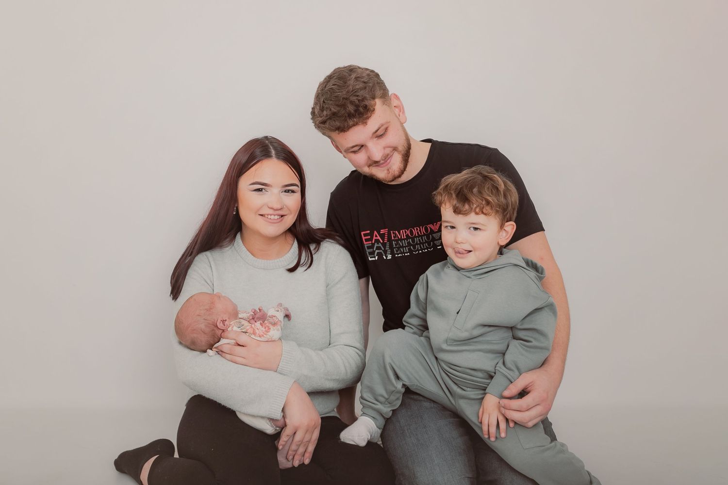 Casual family portrait session with everyone dressed in coordinating neutral colours. Photographer. Hull. East Yorkshire. Photography