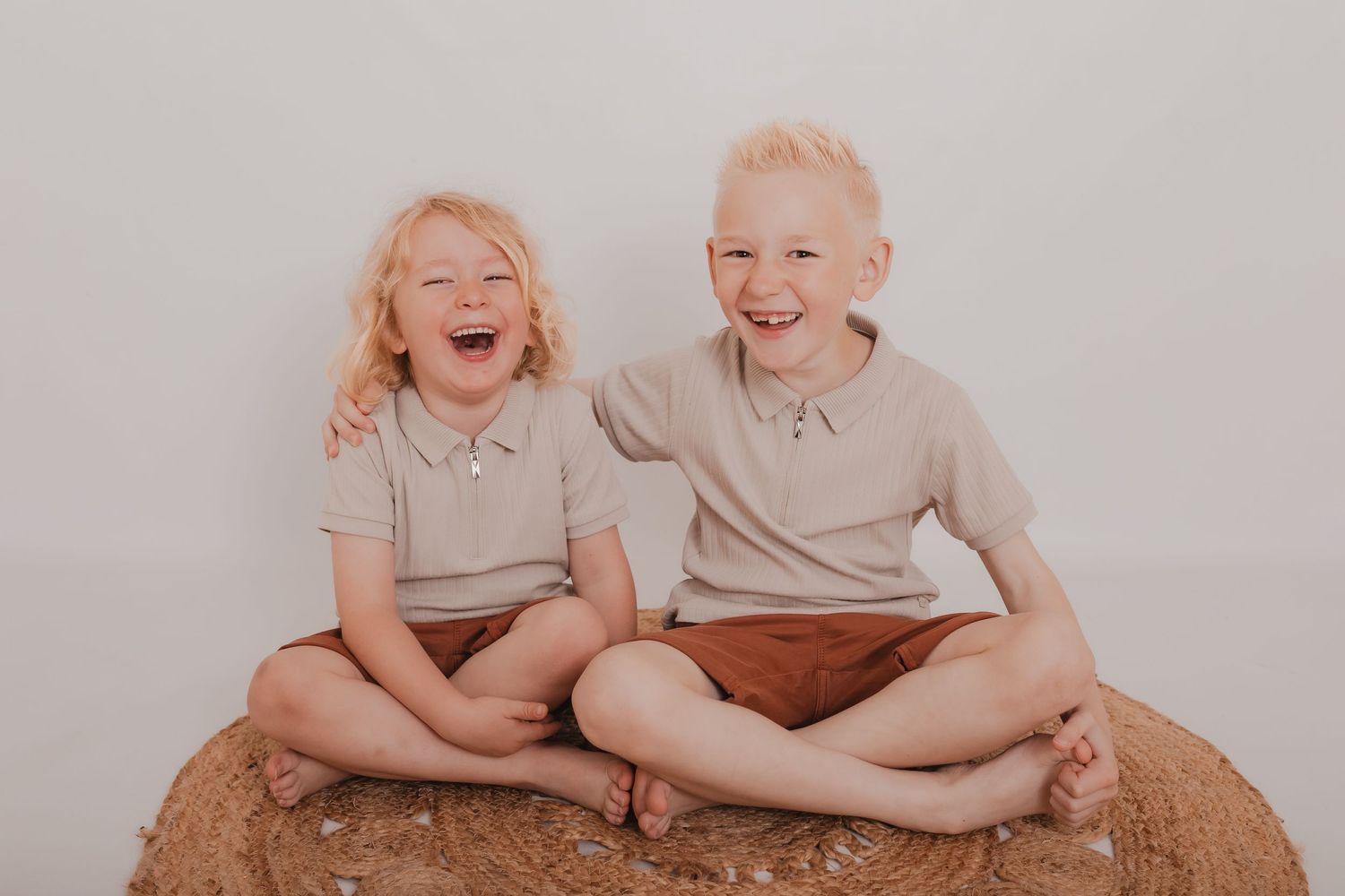 Multiple shots of children laughing together during a studio photo session. Photographer. Hull. East Yorkshire. Photography