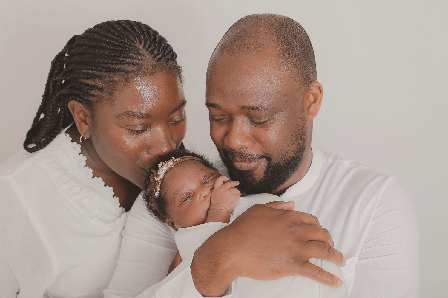 Intimate family portraits showing tender moments between parents and baby. Photographer. Hull. East Yorkshire. Photography
