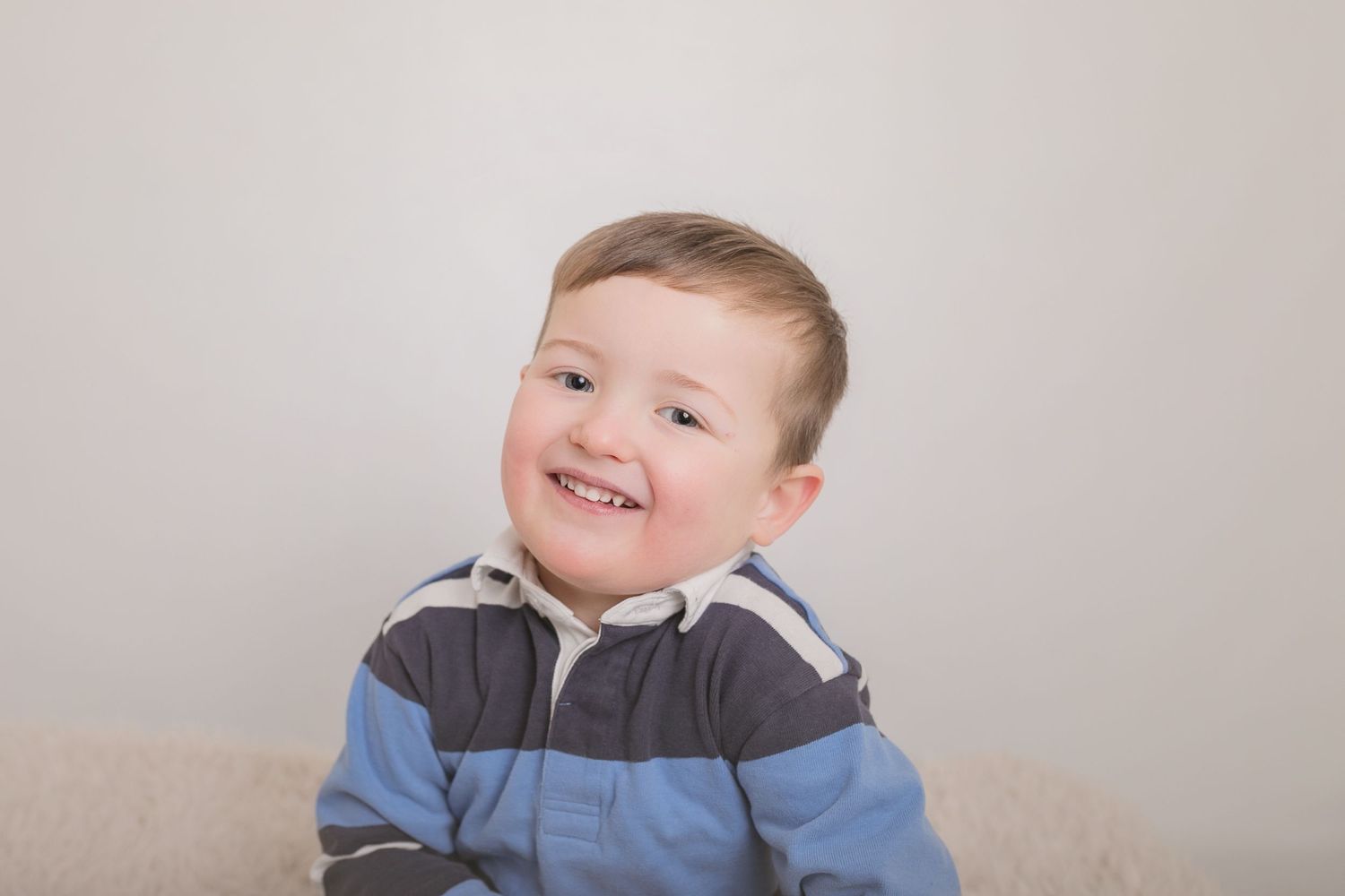 A joyful close-up portrait showing a bright, genuine smile. Photographer. Hull. East Yorkshire. Photography