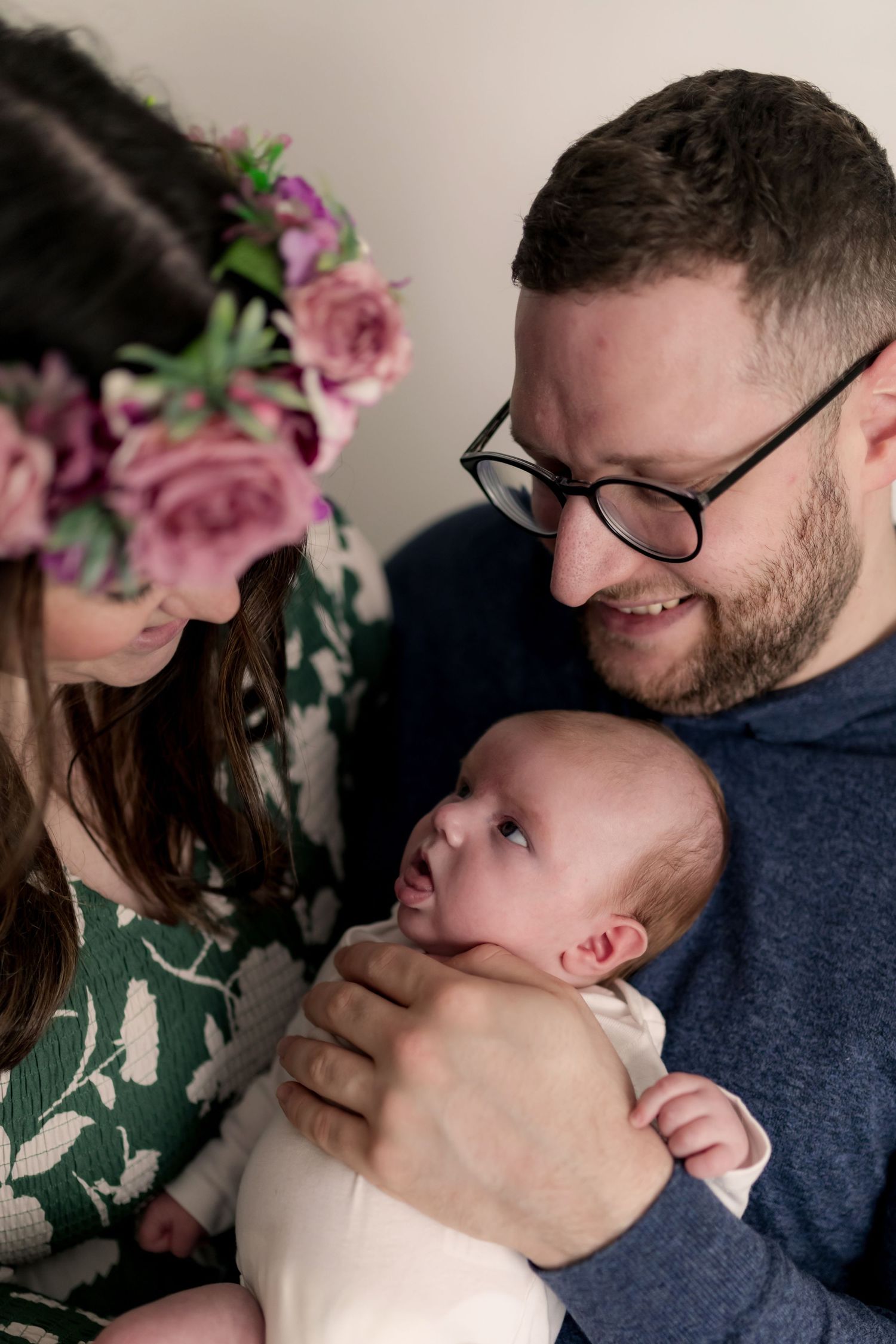 Intimate family portrait session with floral accents and navy clothing. Photographer. Hull. East Yorkshire. Photography