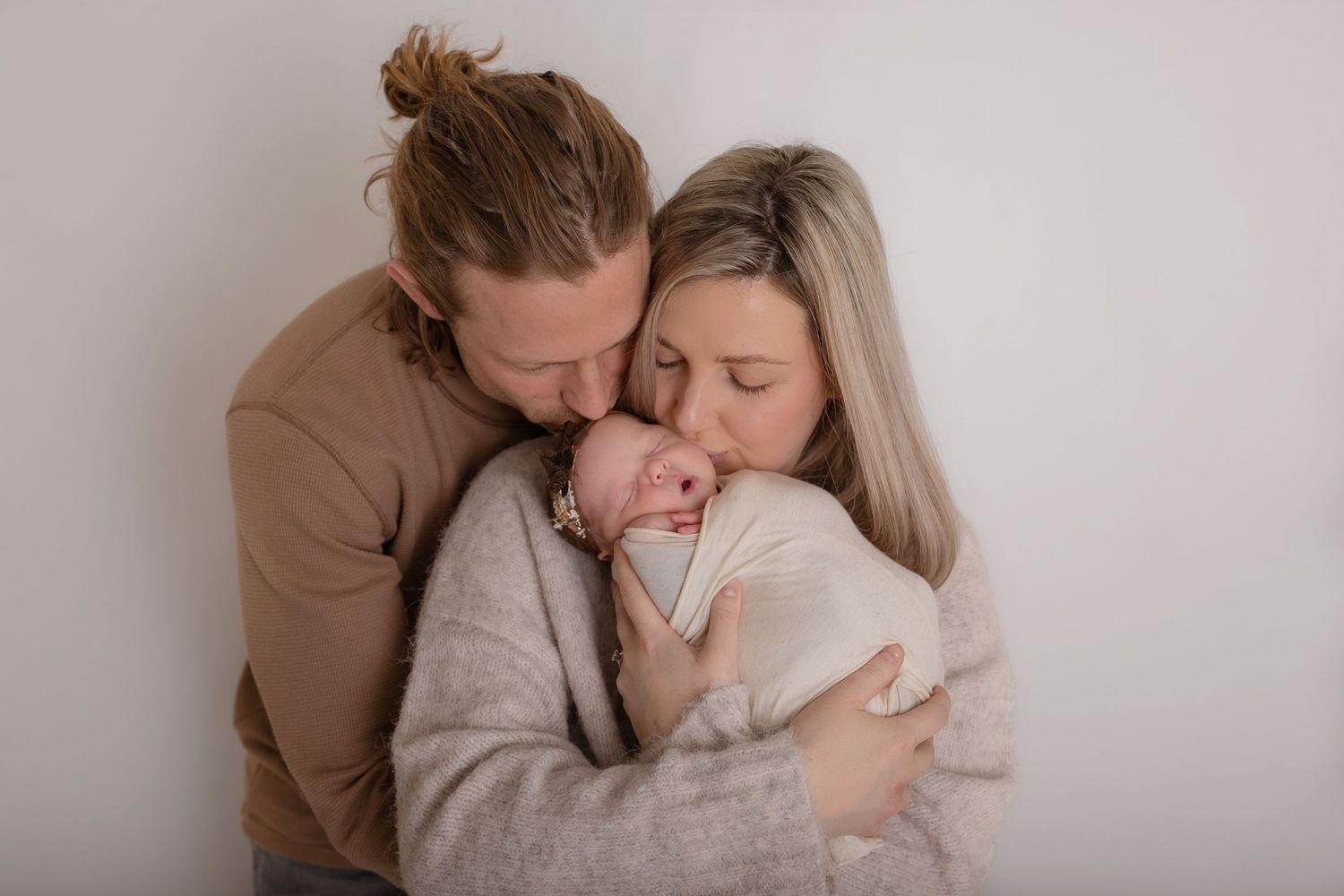Tender lifestyle portrait session against a neutral backdrop in soft lighting.  Photographer. Hull. East Yorkshire. Photography