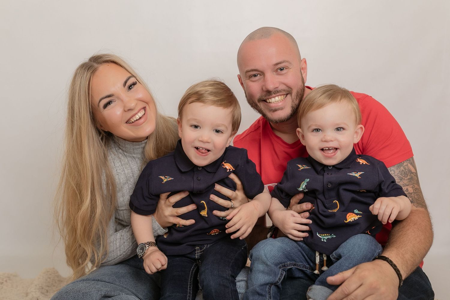 A heartwarming family portrait against a neutral background. Photographer. Hull. East Yorkshire. Photography