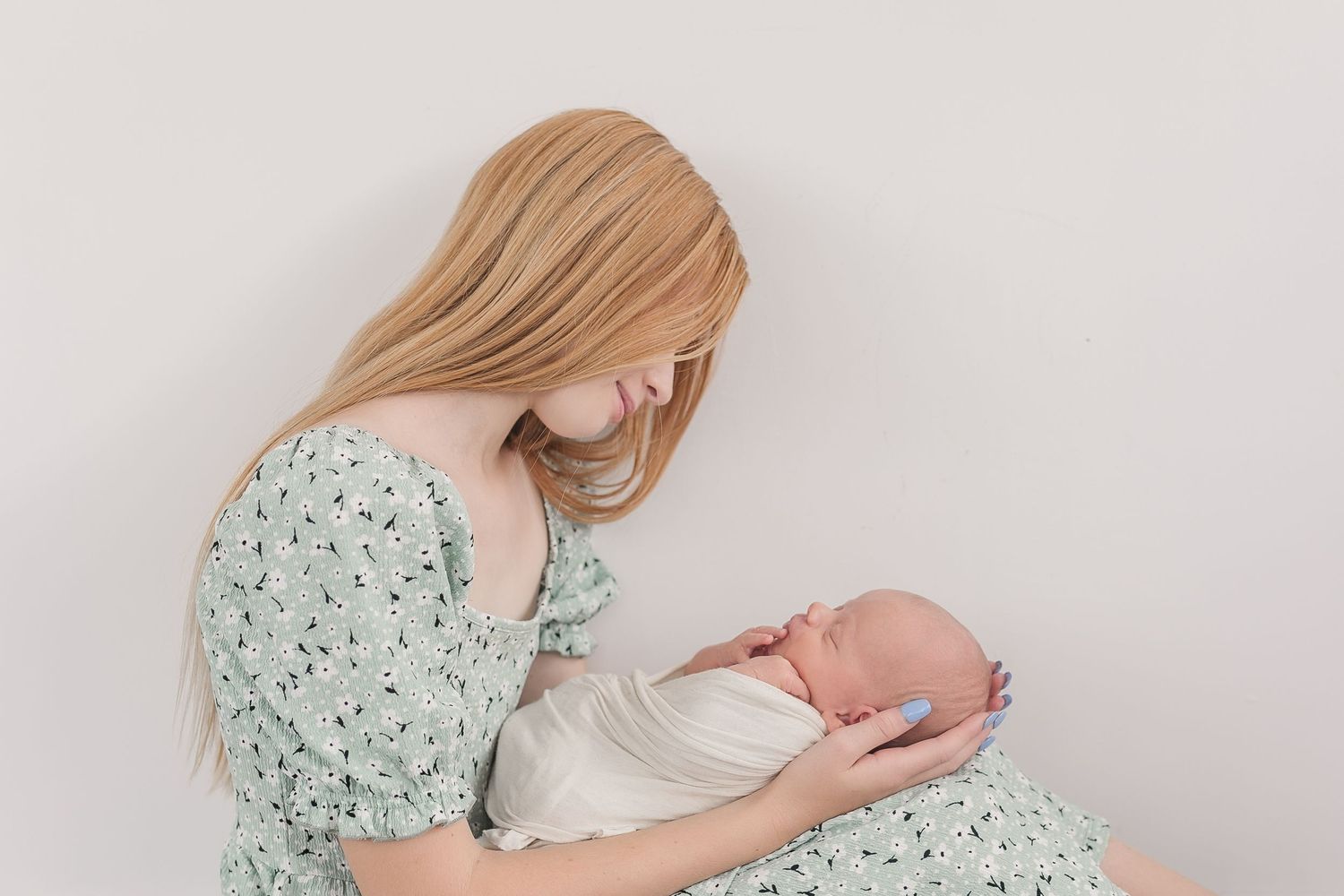 Studio portraits featuring soft moments in pastel floral dress.  Photographer. Hull. East Yorkshire. Photography