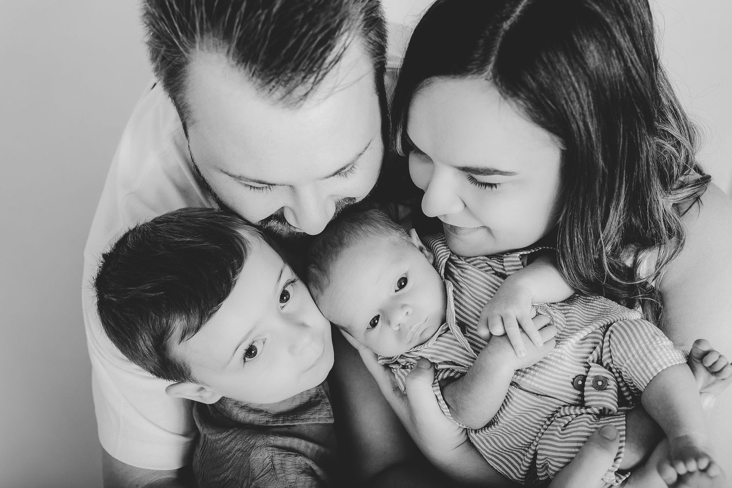 Black and white series of close-up family portraits showing affection. Photographer. Hull. East Yorkshire. Photography