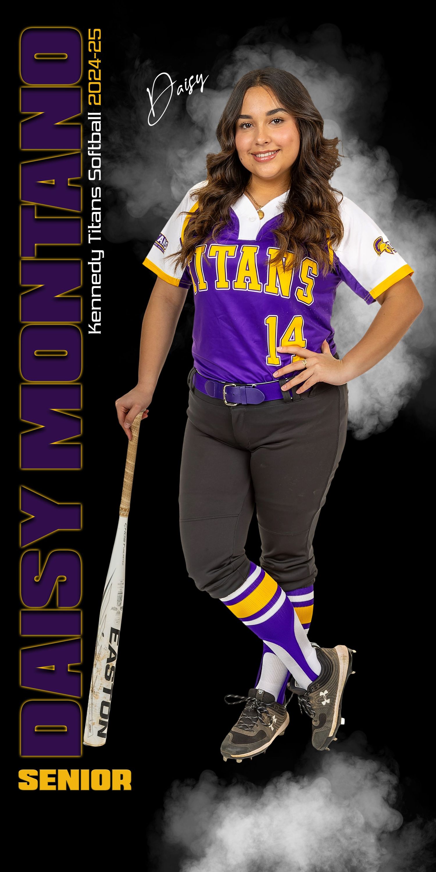 High school softball player in purple Titans uniform poses with bat against smoky background.