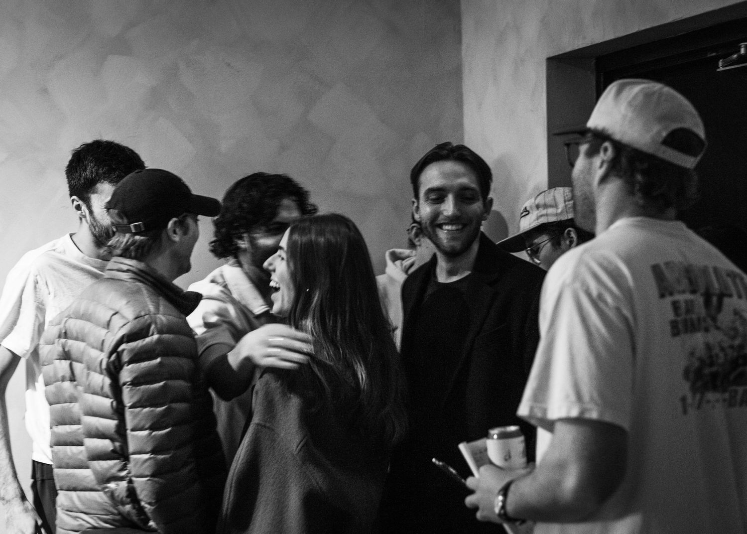 Event photography capturing live moments from the 'Mess Produced' comedy show with performers on stage and audience reactions.