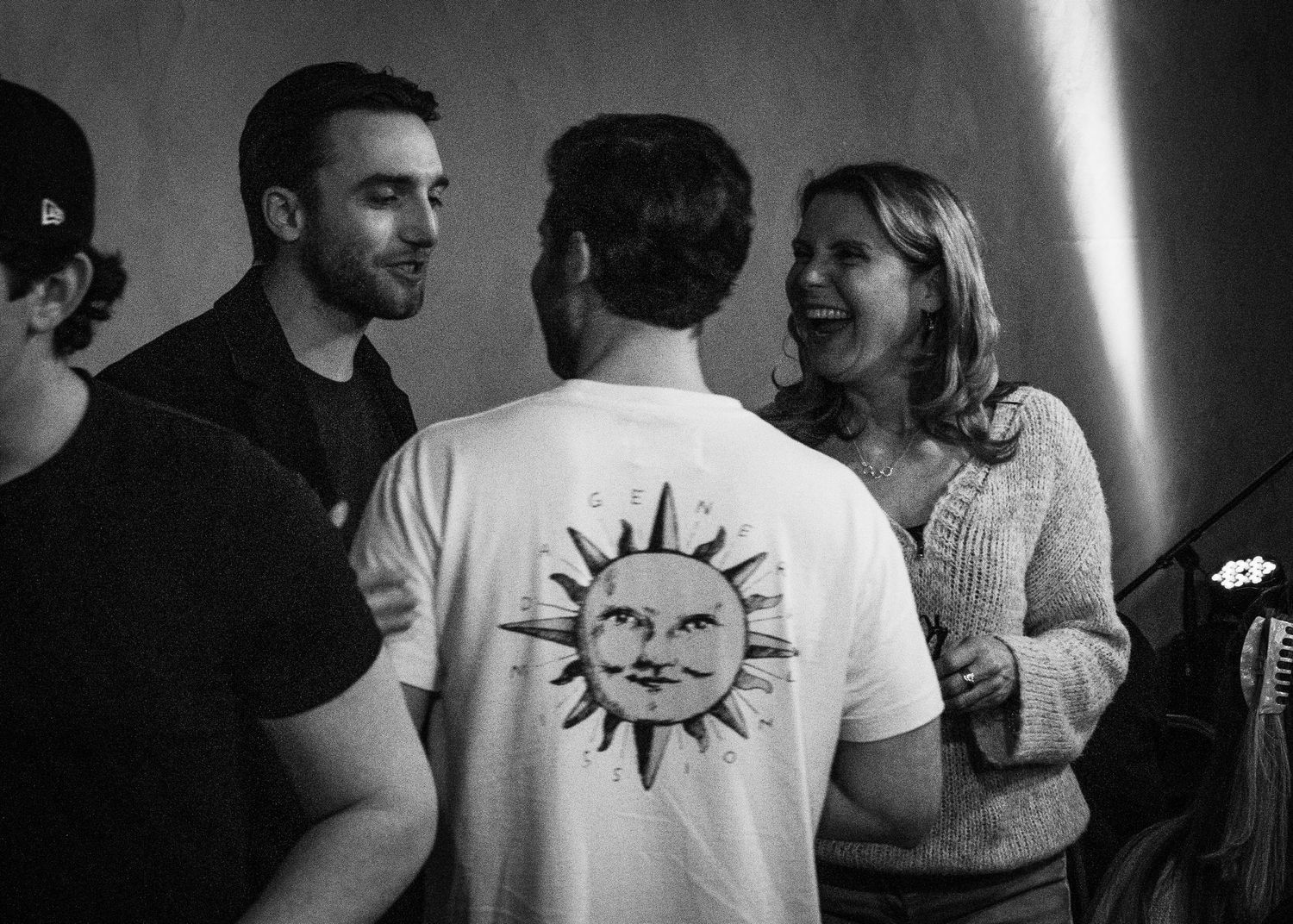 Event photography capturing live moments from the 'Mess Produced' comedy show with performers on stage and audience reactions.