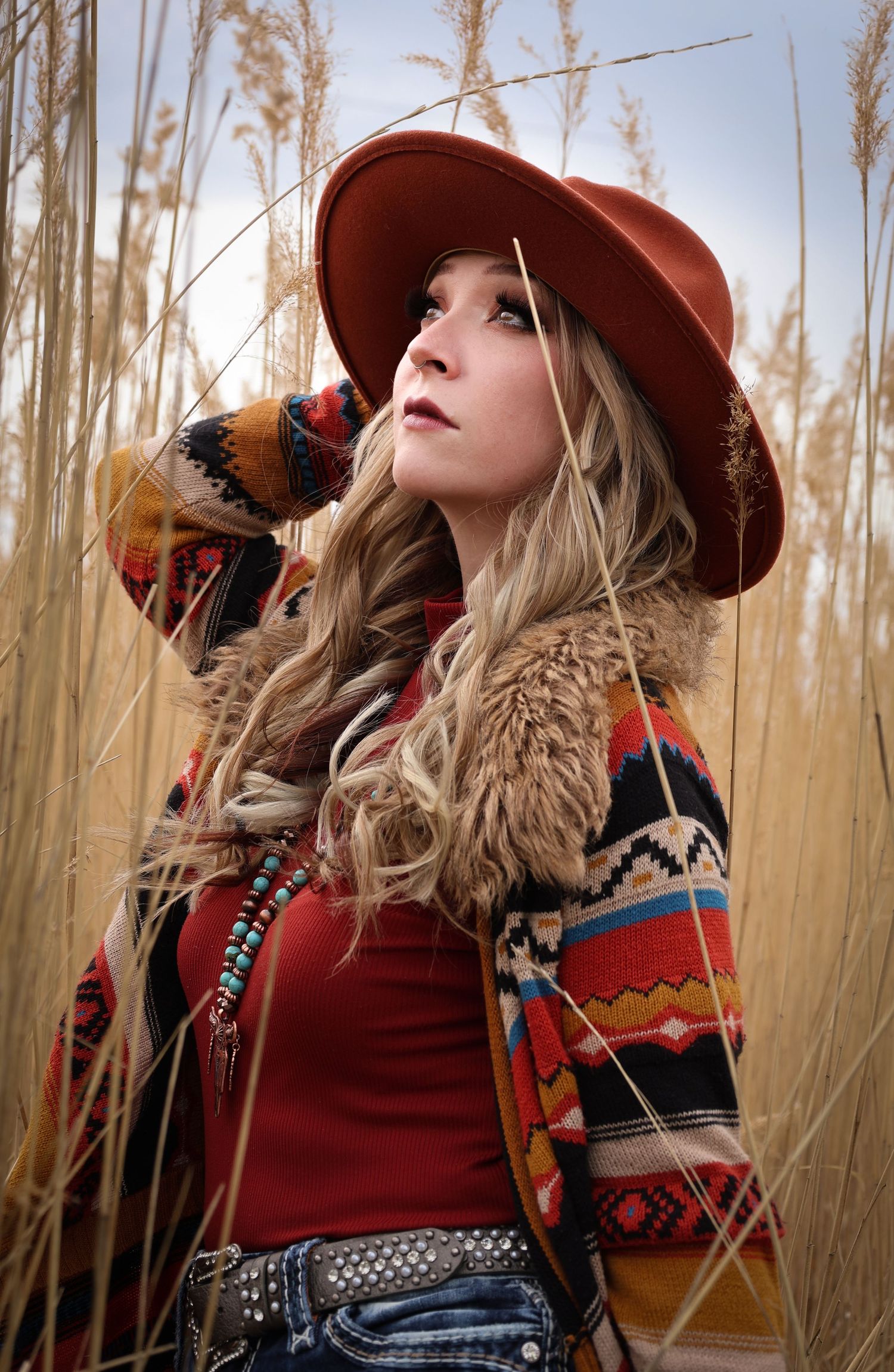 beautiful portrait with fall vibes in the grass