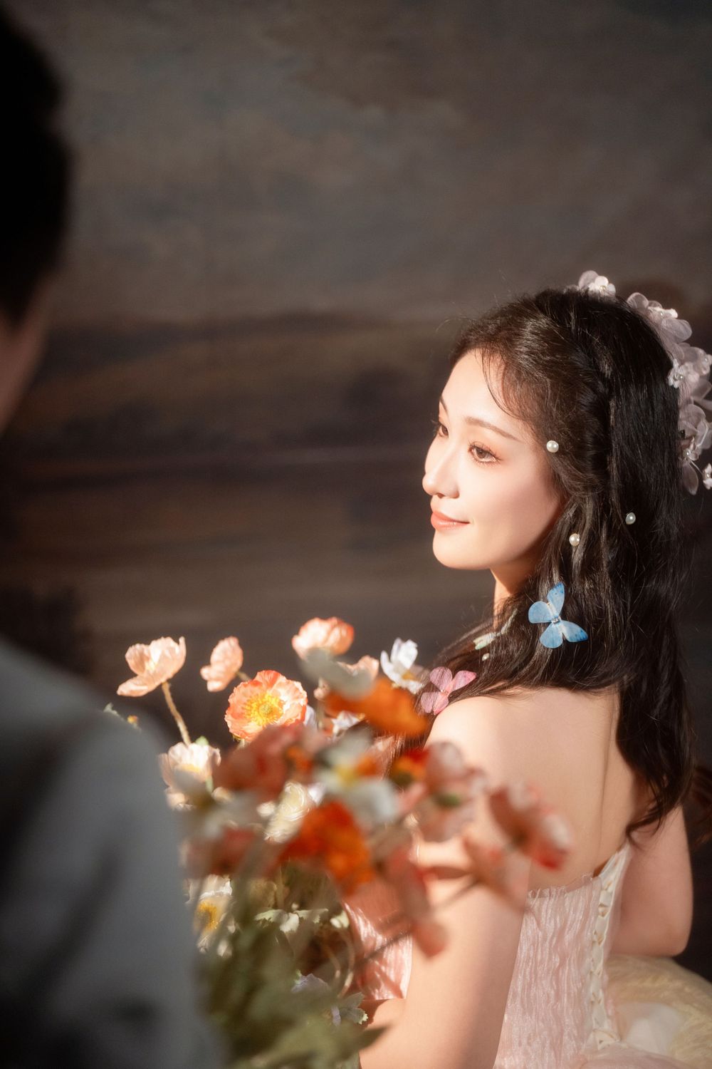 Dramatic light and shadow wedding portrait using a softbox for a moody vintage HK film look, captured by Imagine Image Studio.