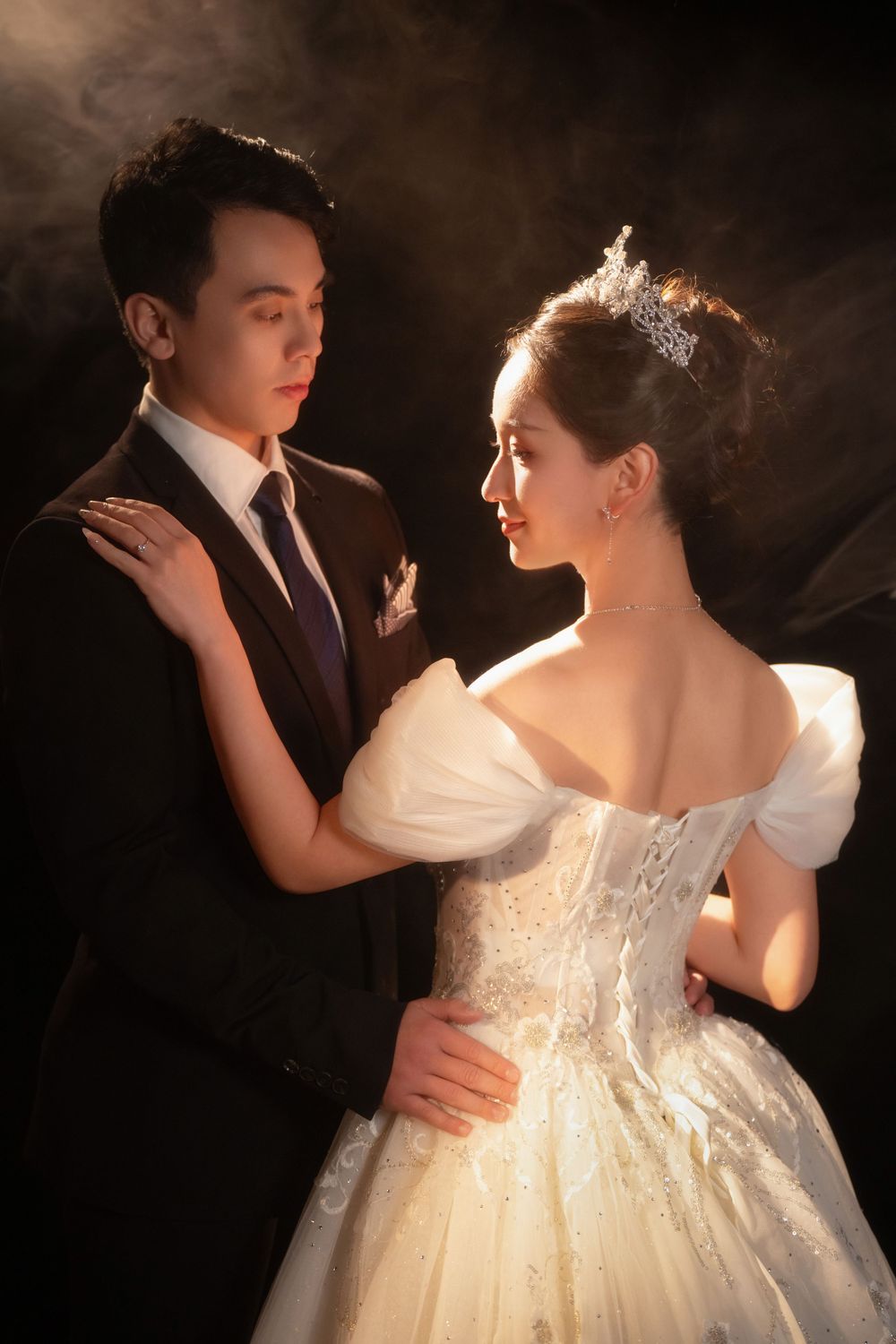 Dramatic light and shadow wedding portrait using a softbox for a moody vintage HK film look, captured by Imagine Image Studio.