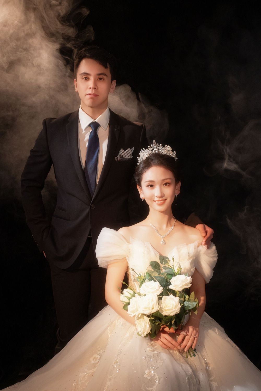 Moody and romantic vintage inspired studio bridal photo with soft lighting and dramatic shadows, by Imagine Image Studio.