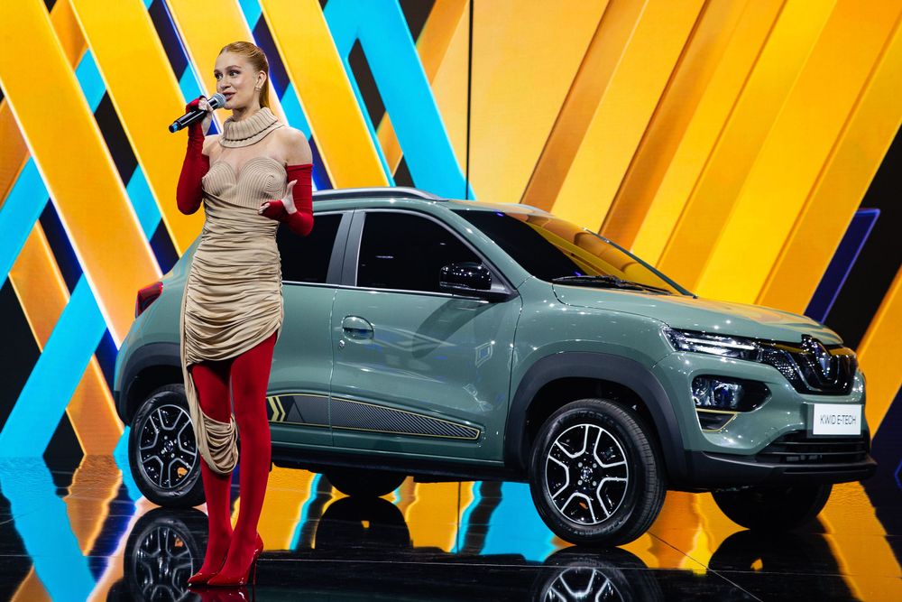 Car showcase with vibrant yellow and blue geometric backdrop design.