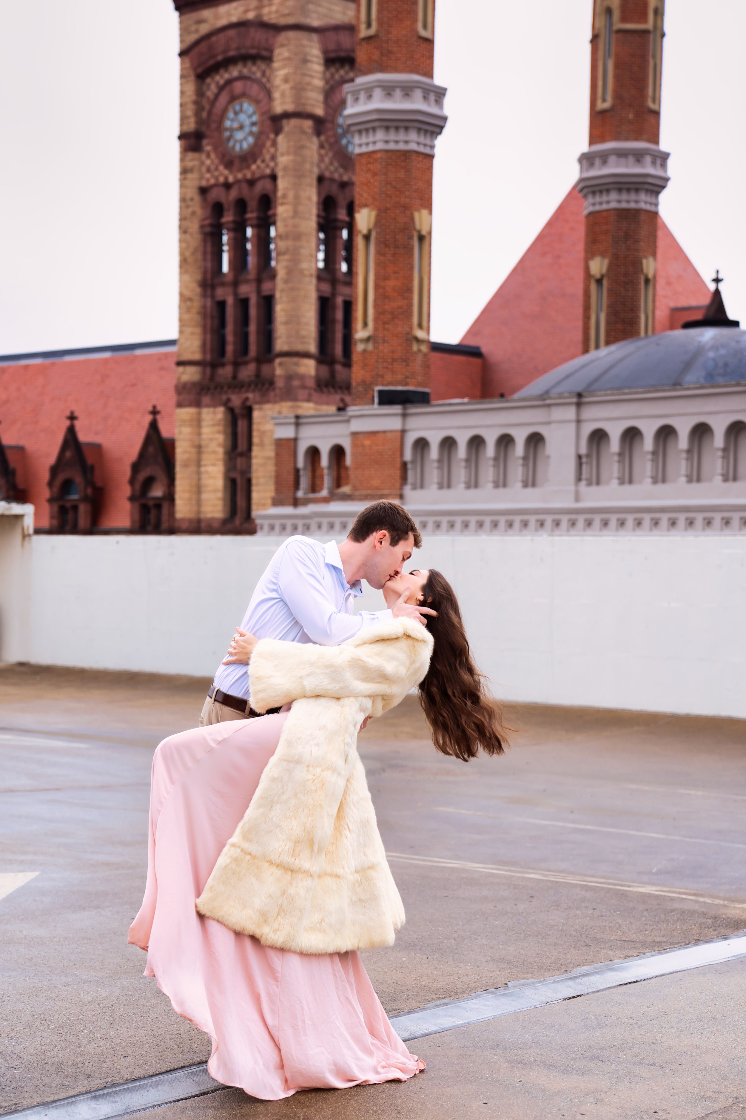 Couple getting engagement photos done in downtown Cincinnati Ohio on a rooftop : Cincinnati Wedding Photographer - Engagement Photographer