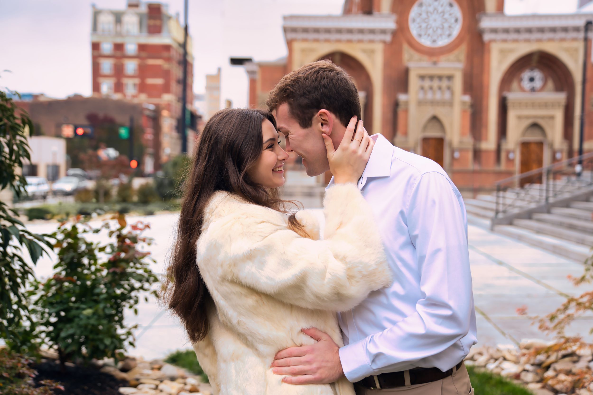 Couple getting engagement photos done in downtown Cincinnati Ohio on a rooftop : Cincinnati Wedding Photographer - Engagement Photographer