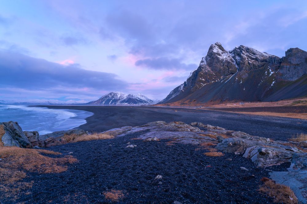 Eystrahorn mountain range in southeastern Iceland captured at dusk.