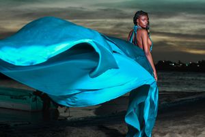 Luxury Flying Dress Portrait at Sunset from destination Photoshoot in Punta Cana captured by Marley Domeck