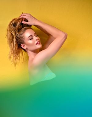 High Fashion Beauty Portrait of Lauren with Vibrant Yellow Background by Marley Domeck