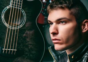 Editorial Portrait of Musician with Acoustic Guitar by Marley Domeck