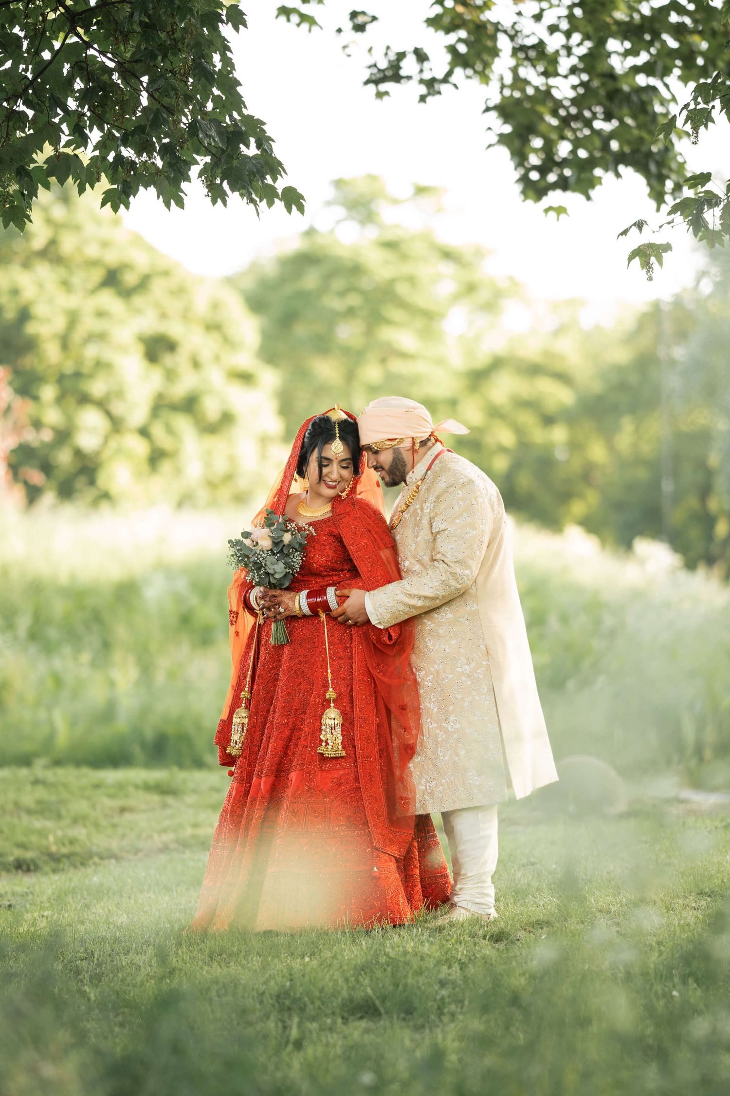 Happy newlyweds were captured on picture by the photographer expressing deep love and receiving blessings from Guru Nana