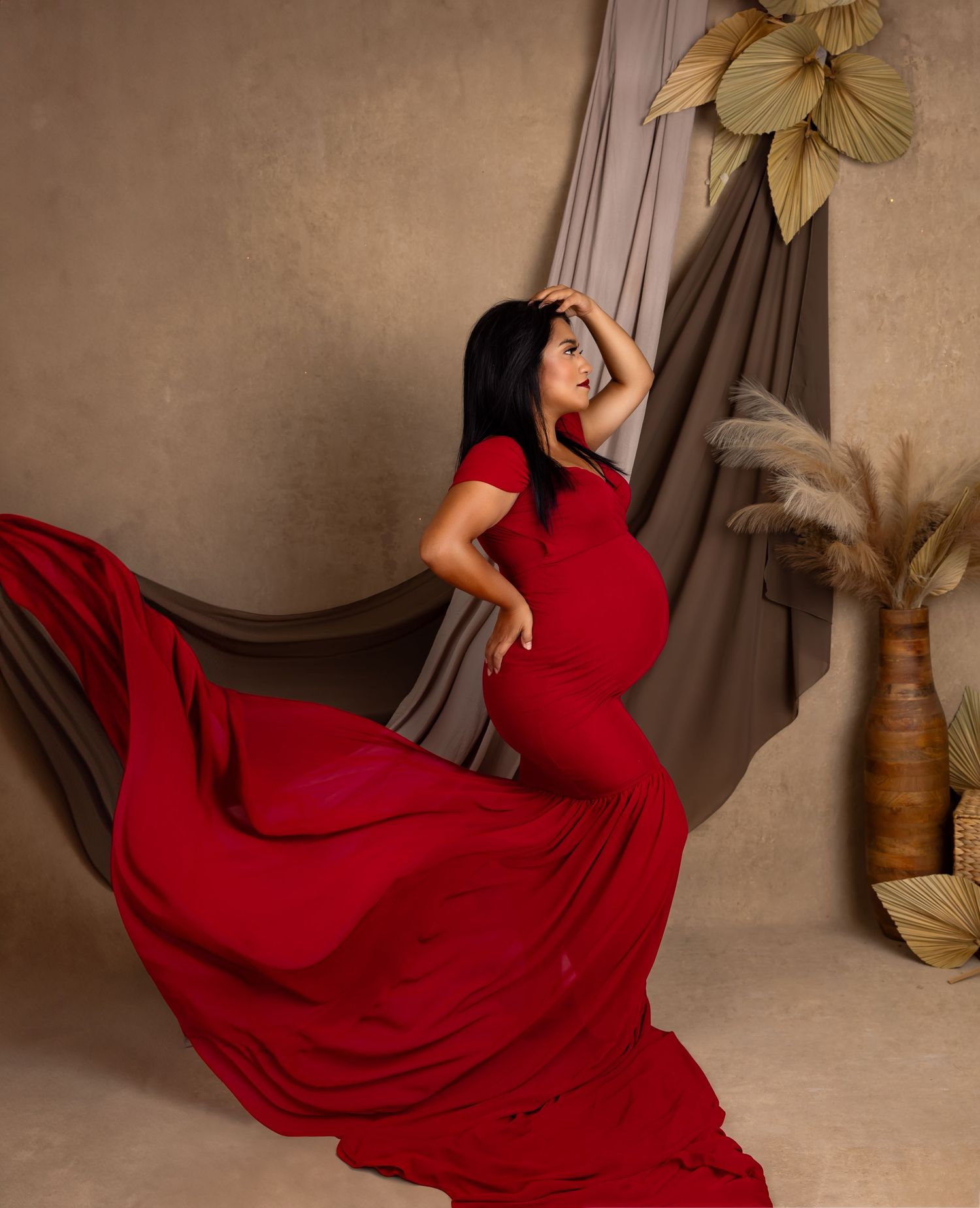 red gown maternity shoot