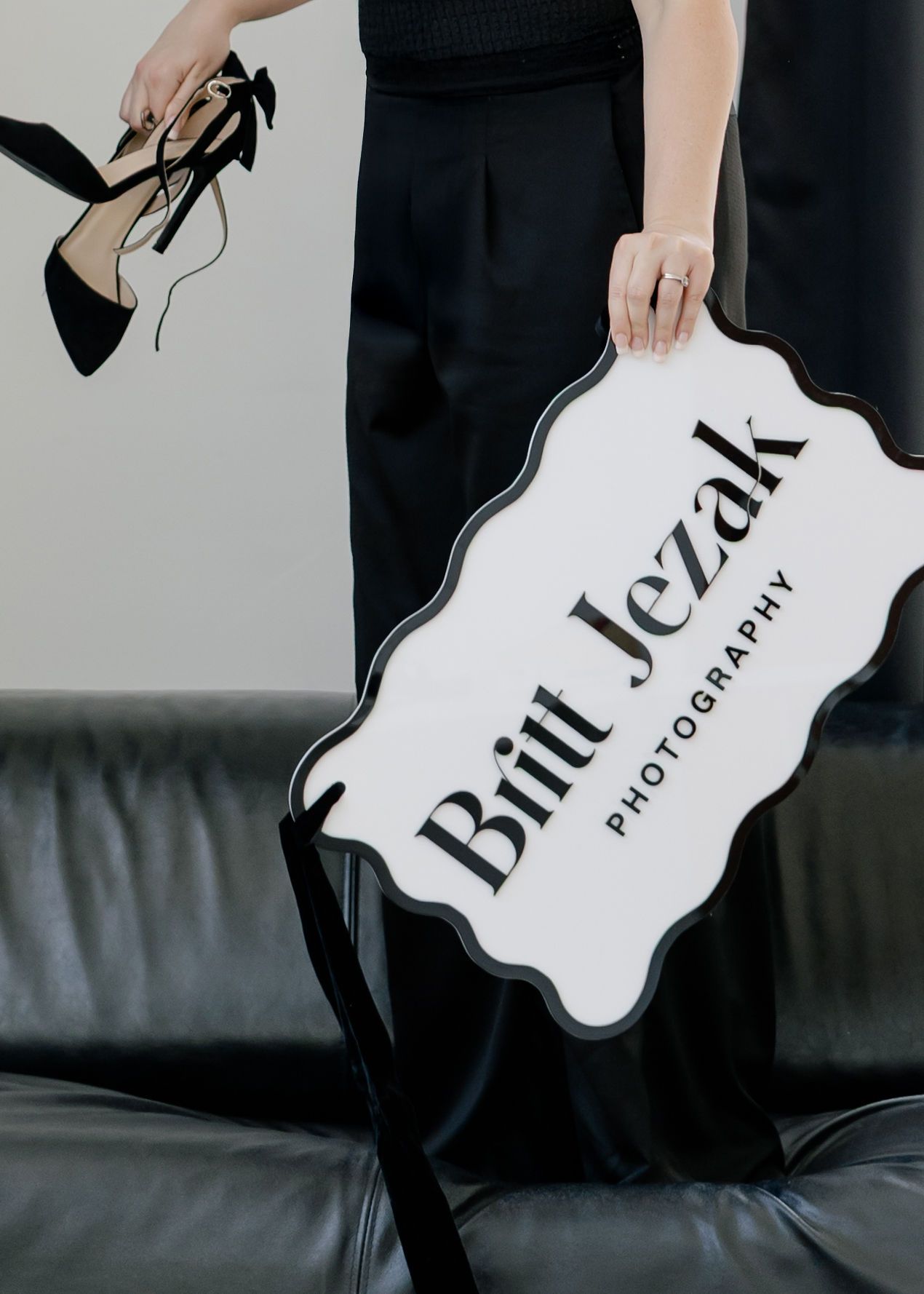 Close-up shots of decorative shopping bags with text in elegant design.