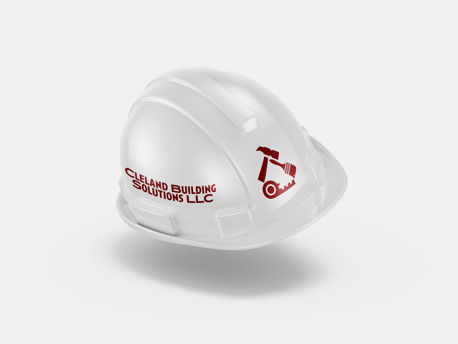 White construction hard hat with red company logo displayed on the side against light background.