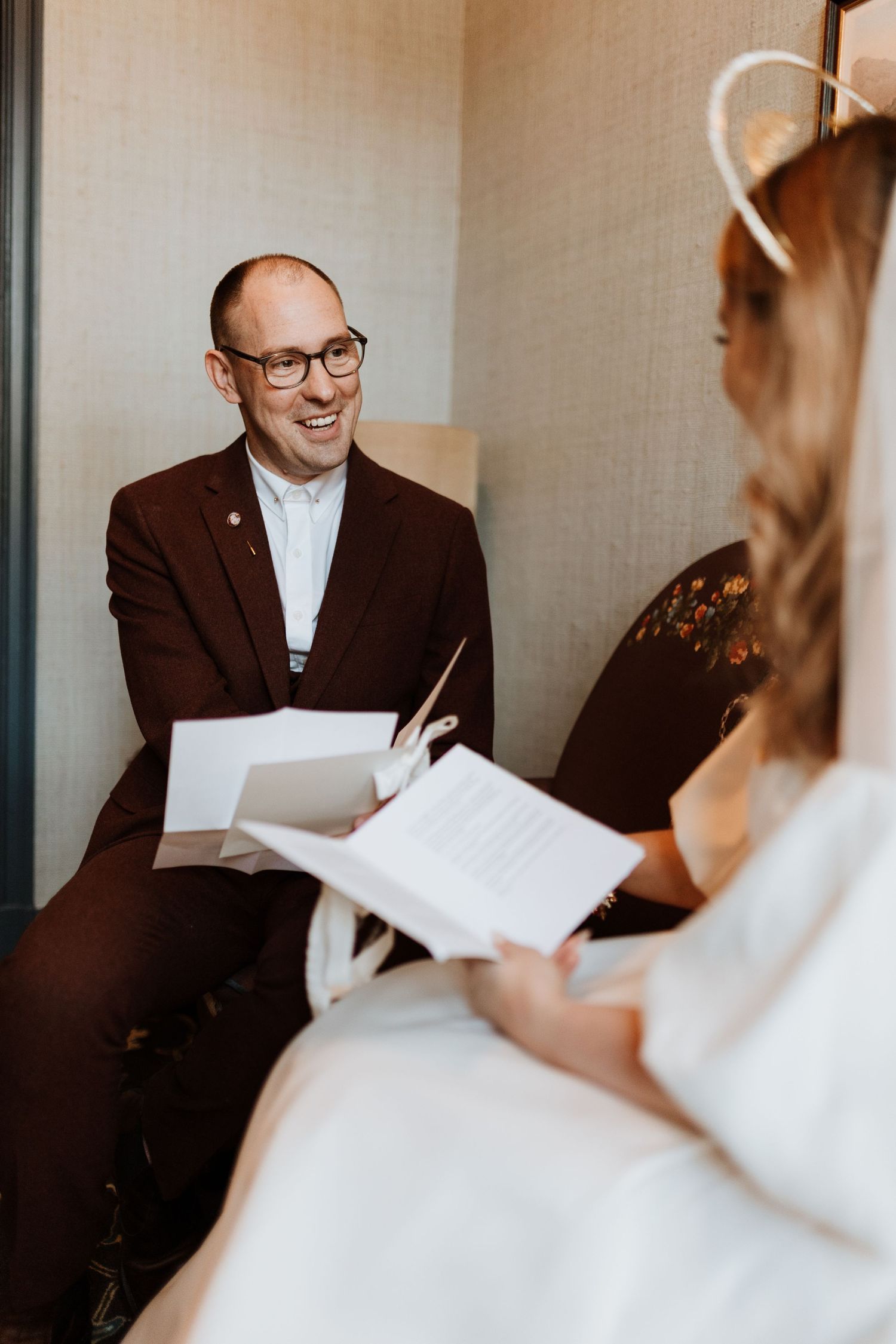 Couple exchanging vows privately on their wedding morning before ceremony