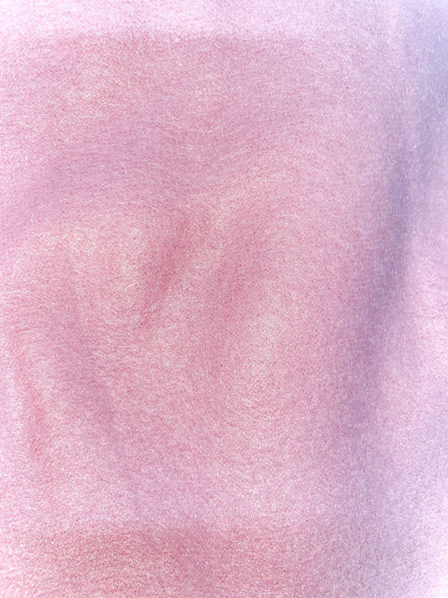 Soft pink and purple gradient background with ethereal texture.