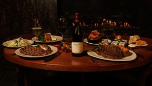 Food photography for The Keg featuring a holiday themed dinner spread and an iconic bottle of Meiomi in the centre.
