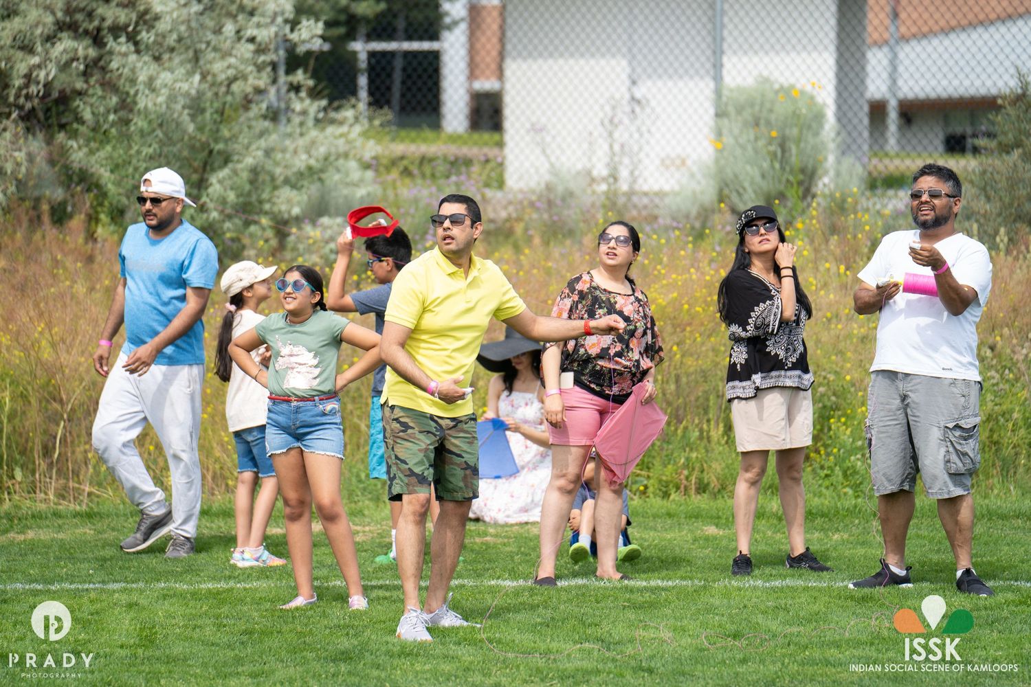 Group of participants engaged in outdoor activities during a summer event.