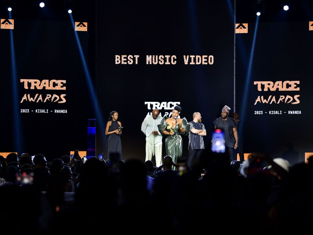 Best Music Video category presentation at the Trace Awards with crowd in silhouette.