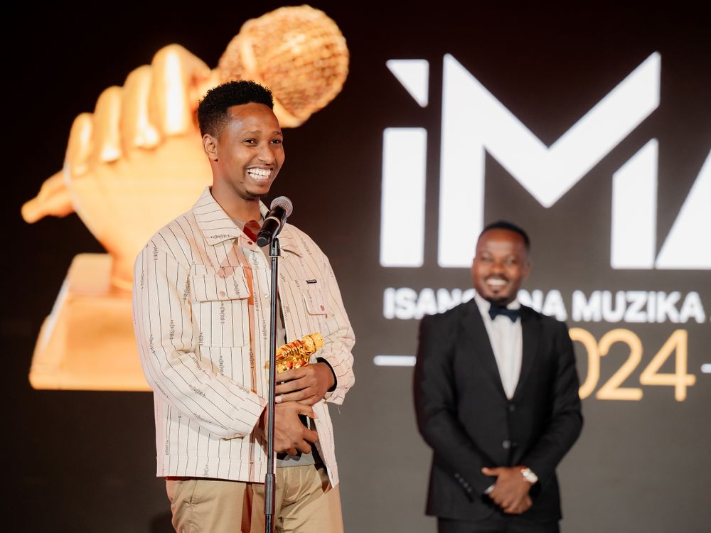 Award recipient gives acceptance speech at IMA 2024 Awards ceremony.