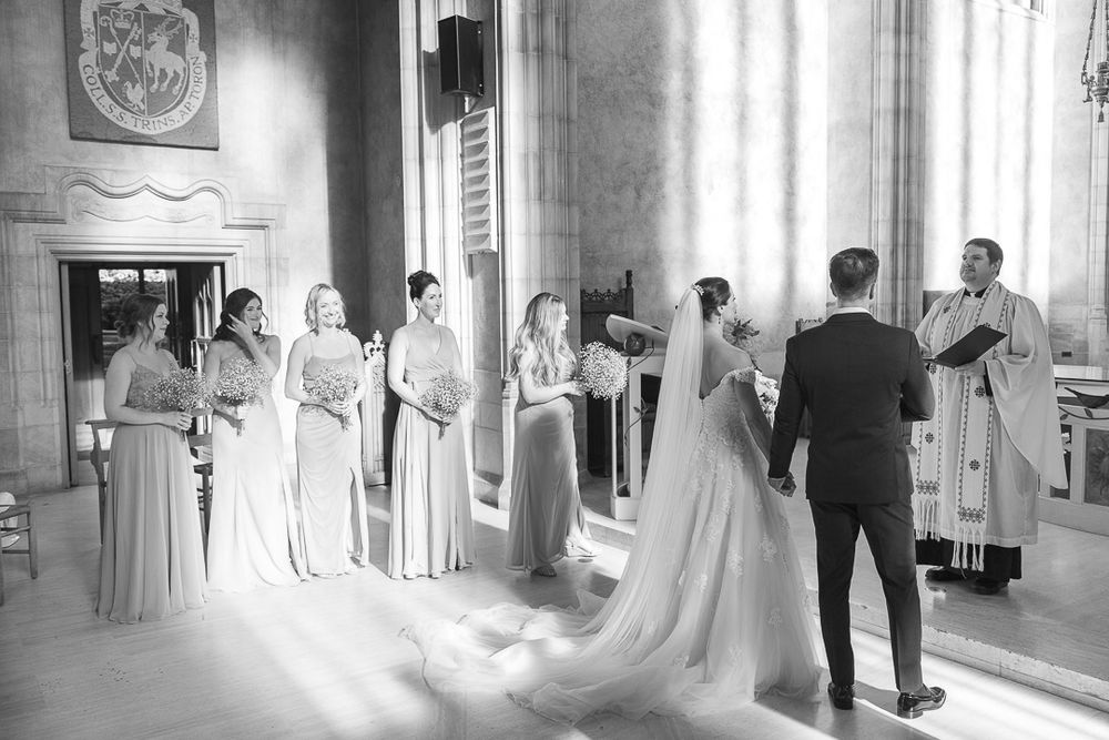 Wedding ceremony inside a Toronto church photography by Shermond Schoberg