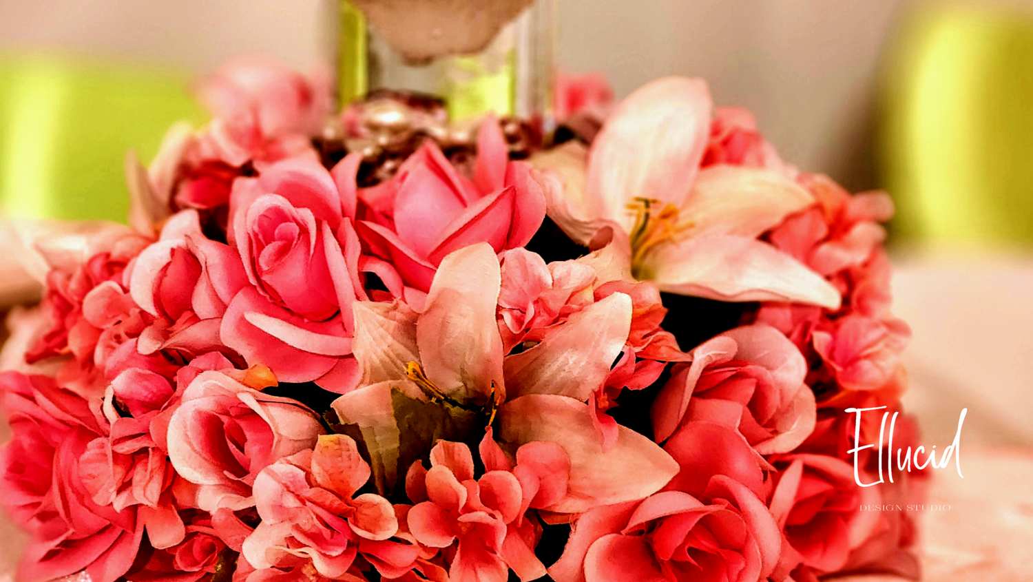 Vibrant bouquet of pink roses and lilies in full bloom.