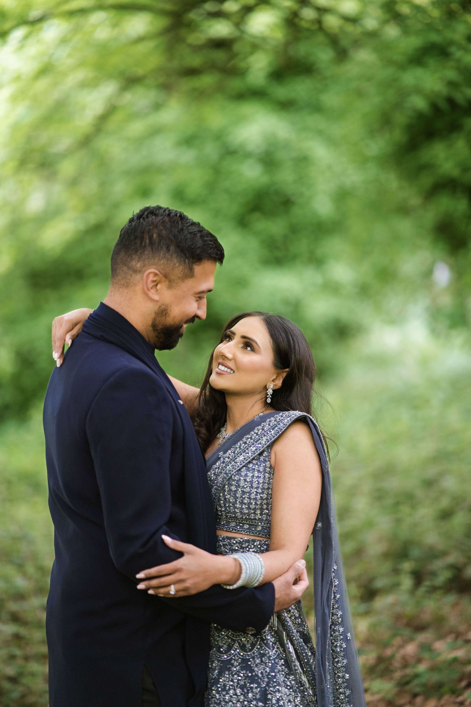 Newly weds expressing their love through eye contact sharing a special moment captured by the camera